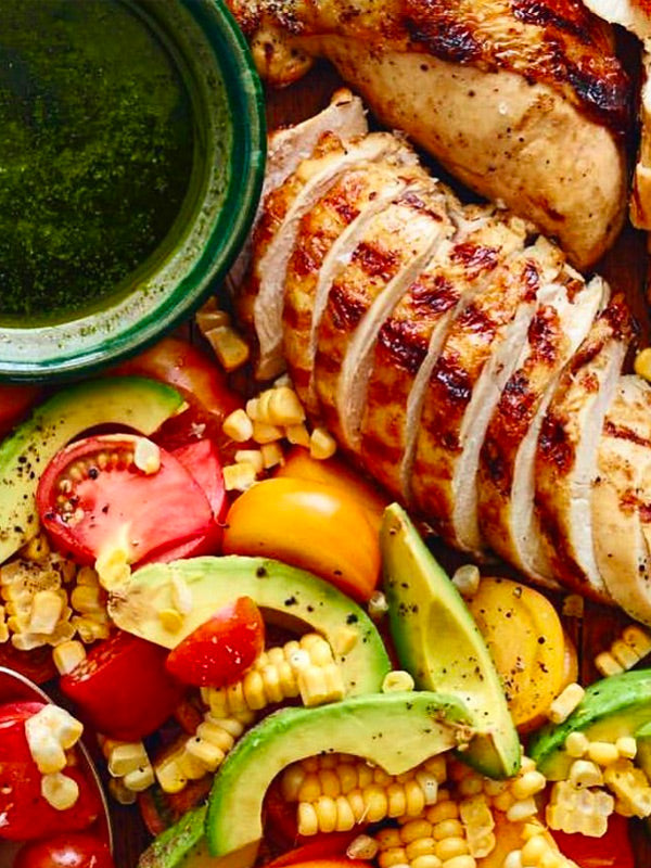 Grilled Chicken with a Fresh Tomato Avocado Salad and Tangy Cilantro Sauce